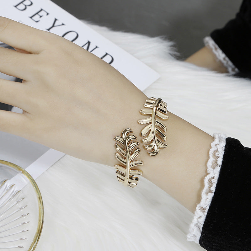 Leaf Design Gold Bracelet for Fashion-Forward Females - Vienna Verve Collection