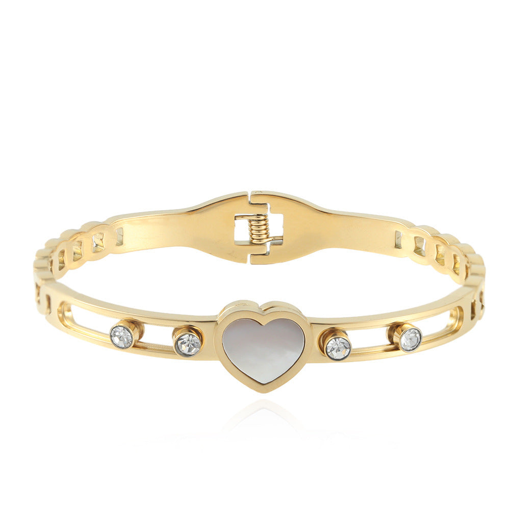 Elegant Hollow Heart Love Bracelet in Titanium Steel - Fashion-Forward Women's Accessory