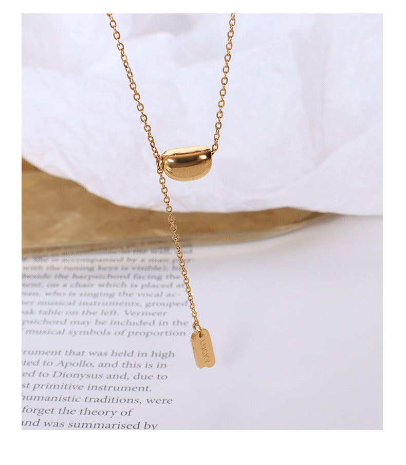 Lucky Gold Bean Tassel Necklace with French-Inspired Design