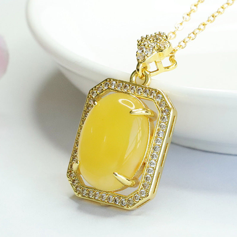 Honey Amber Zircon Oval Pendant in Sterling Silver