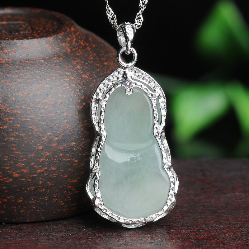 Sterling Silver Guanyin Pendant Necklace with Myanmar Jade Accents