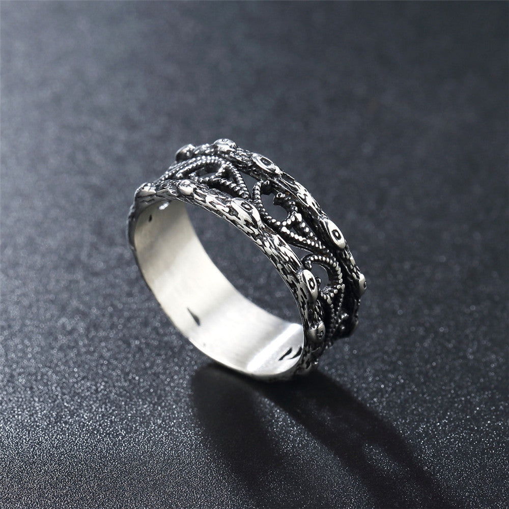 European and American Retro Hollow Tongue Carved Titanium Steel Ring