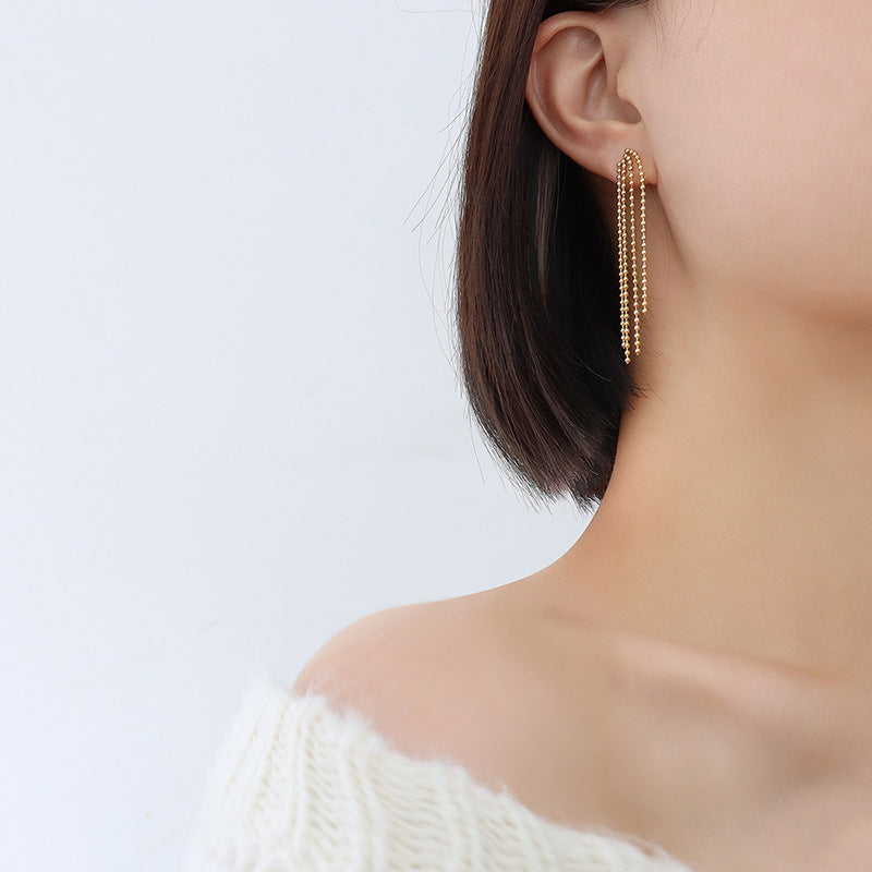 Exaggerated Steel Ball Tassel Earrings with Gold Titanium Plating for a Retro Cold Wind Look