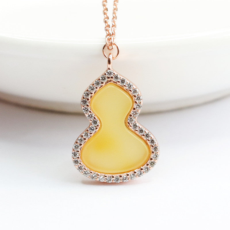 Sterling Silver Gourd Pendant with Beeswax Amber