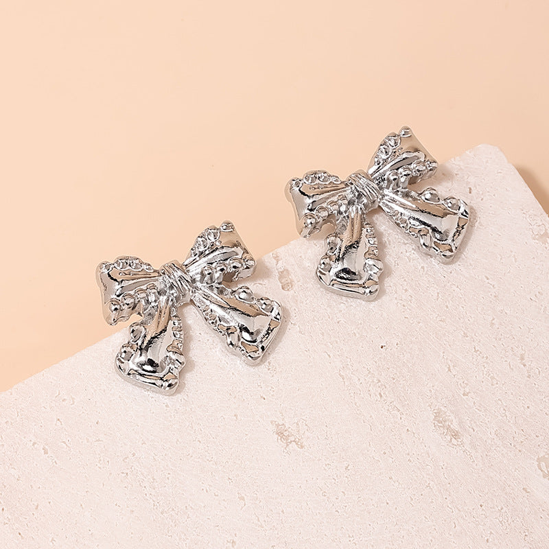 Charming Vienna Verve Metal Bow Earrings for Women