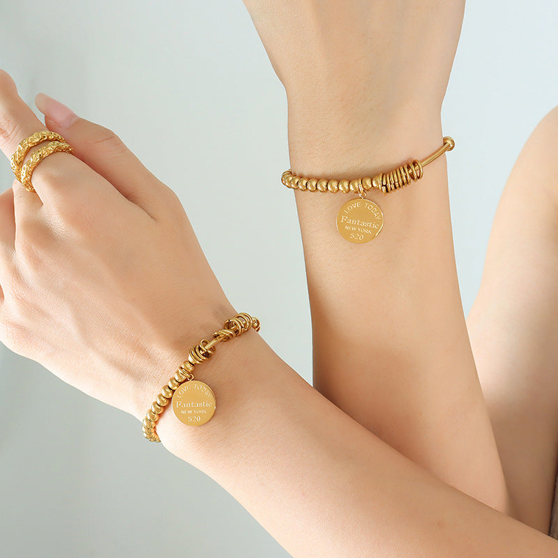 Elastic Titanium Steel Ball Bracelet Set with 18K Gold Accents