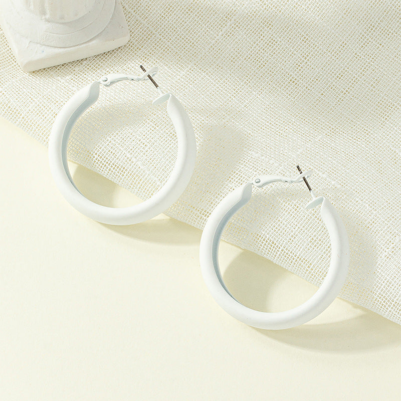 Korean-inspired Exaggerated Painted Circle Earrings with Sleek Design