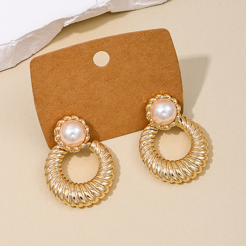 Extravagant Hollow Pearl Droplet Earrings by Planderful Collection