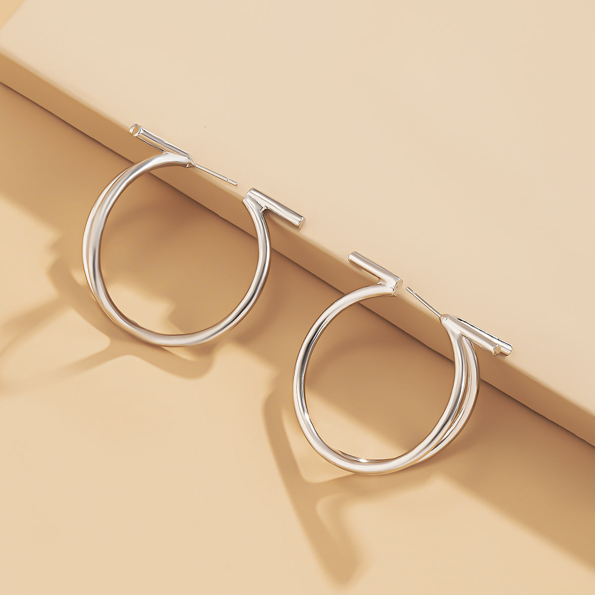 Sleek Crescent-Shaped Earrings with Geometric Cutouts and Three-Dimensional Design for Women