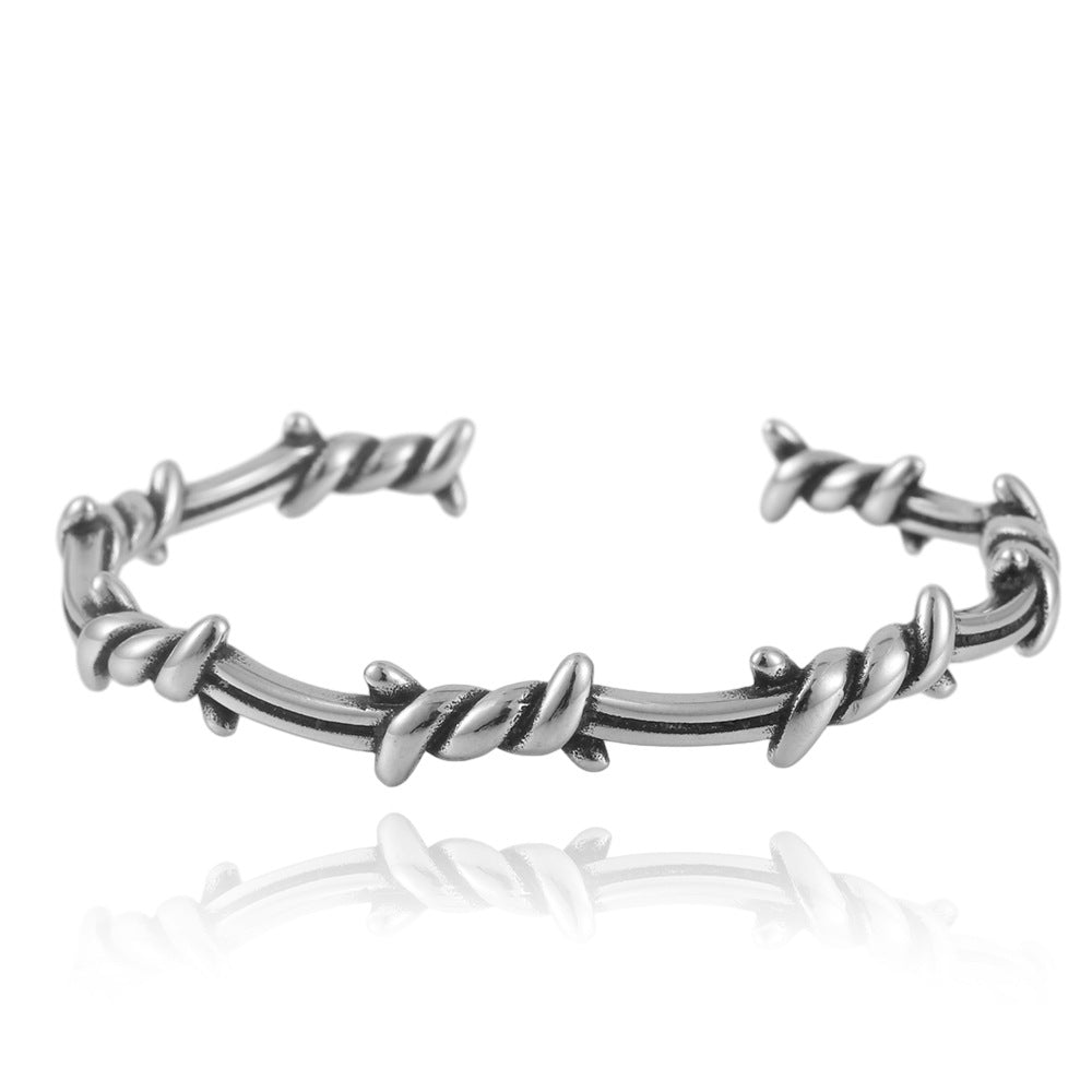 Titanium Steel Men's Winding Bracelet - Edgy Thorn Design for Contemporary Style