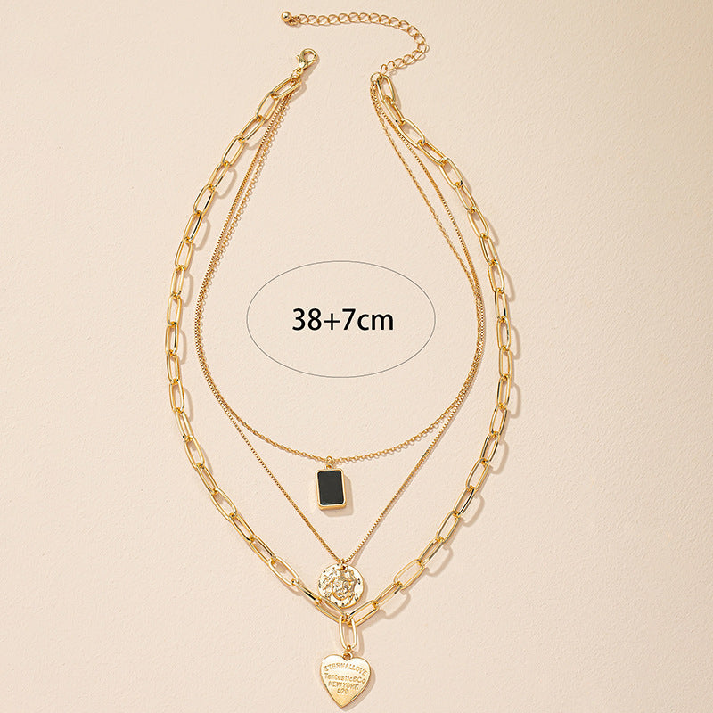 Golden Heart Pendant Collarbone Necklace with Luxe Layered Design