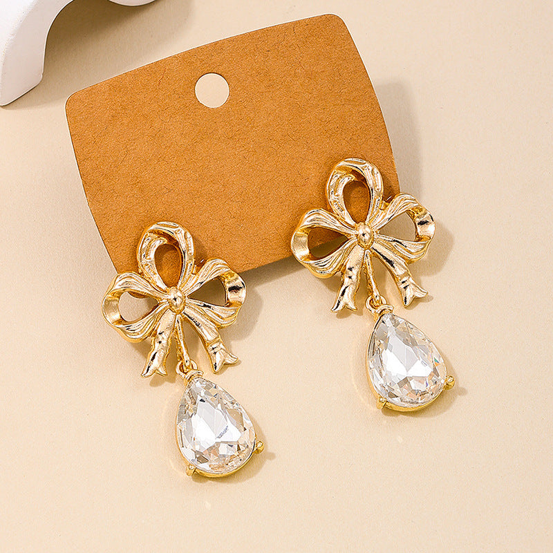 Elegant Retro European Style Hollow Bow Earrings for Women