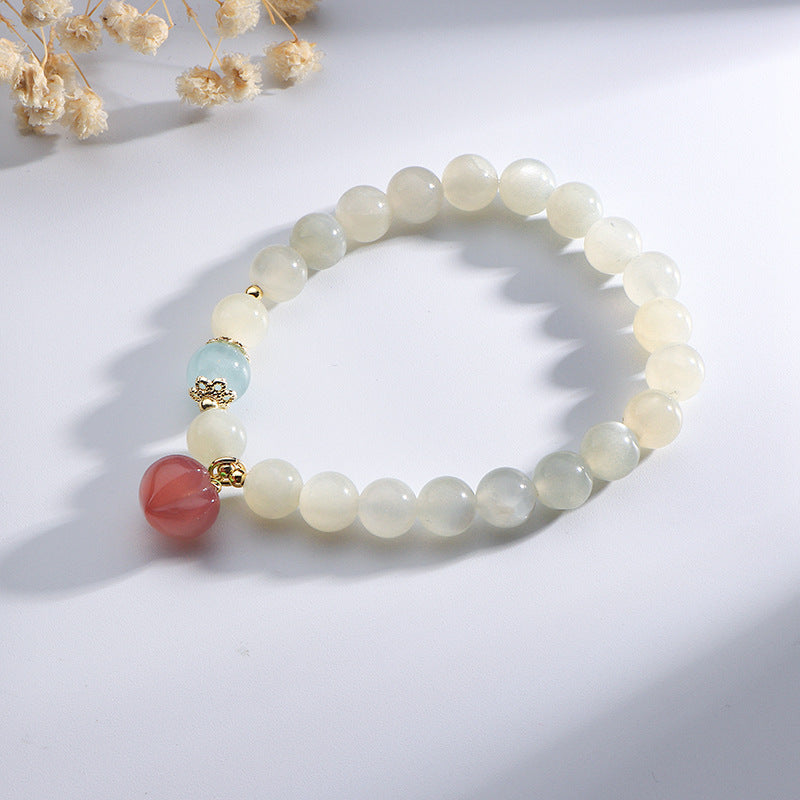 Fortune's Favor Red Agate Crystal Bracelet with Peach Pendant