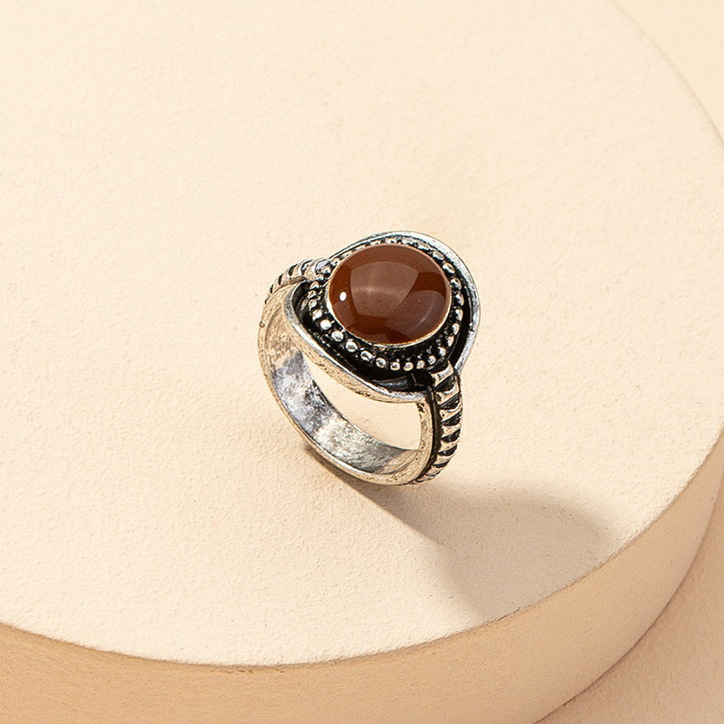 Exquisite Carved Tiger's Eye Ring with Vintage Red Wine Hue