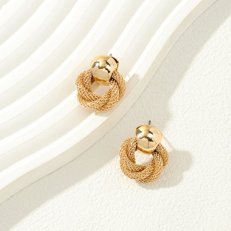 Luxurious Snakeskin Roll Shape Metal Stud Earrings