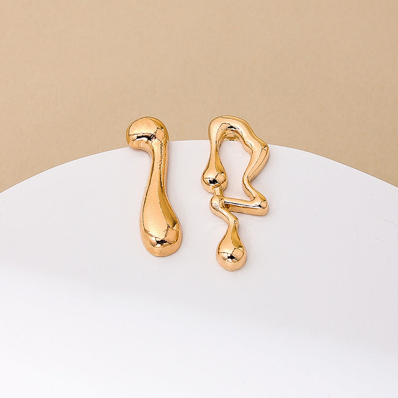 Asymmetrical Lava Vienna Verve Earrings with Music Note Detail