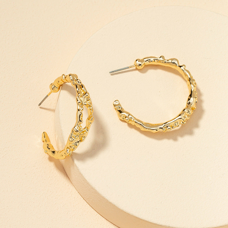 Golden C-Curve Earrings with Vintage Style