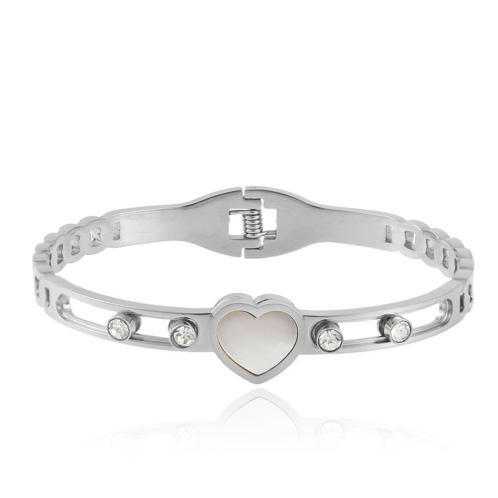 Elegant Hollow Heart Love Bracelet in Titanium Steel - Fashion-Forward Women's Accessory