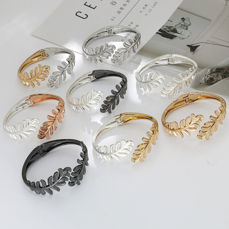 Leaf Design Gold Bracelet for Fashion-Forward Females - Vienna Verve Collection