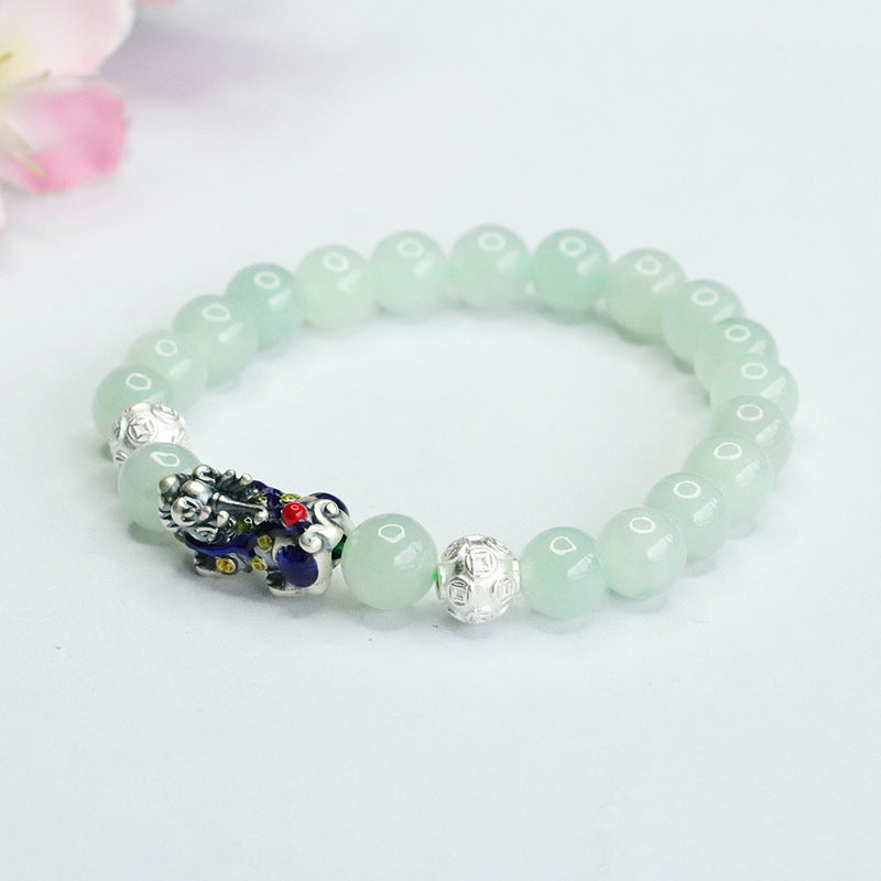 A Jade Bracelet with Sterling Silver and Copper Coin