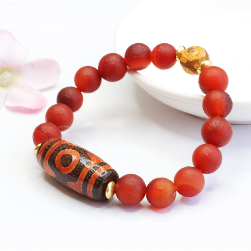 Red Agate Sterling Silver Bracelet with Three Eyed Heavenly Bead