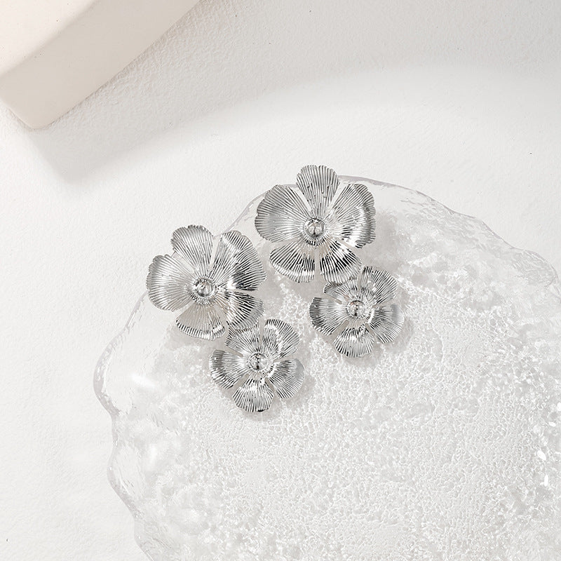 Exaggerated Metal Flower Earrings with Retro Flair