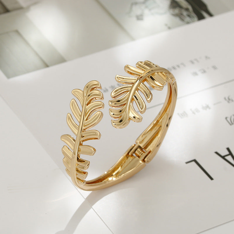 Leaf Design Gold Bracelet for Fashion-Forward Females - Vienna Verve Collection