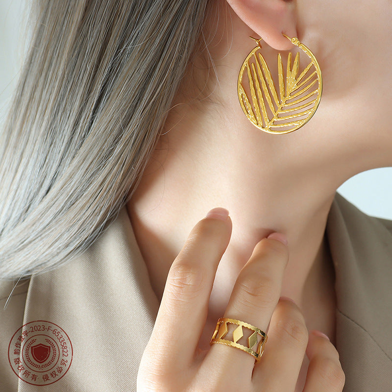 Bamboo Leaf Joker Titanium Earrings with Personality Design