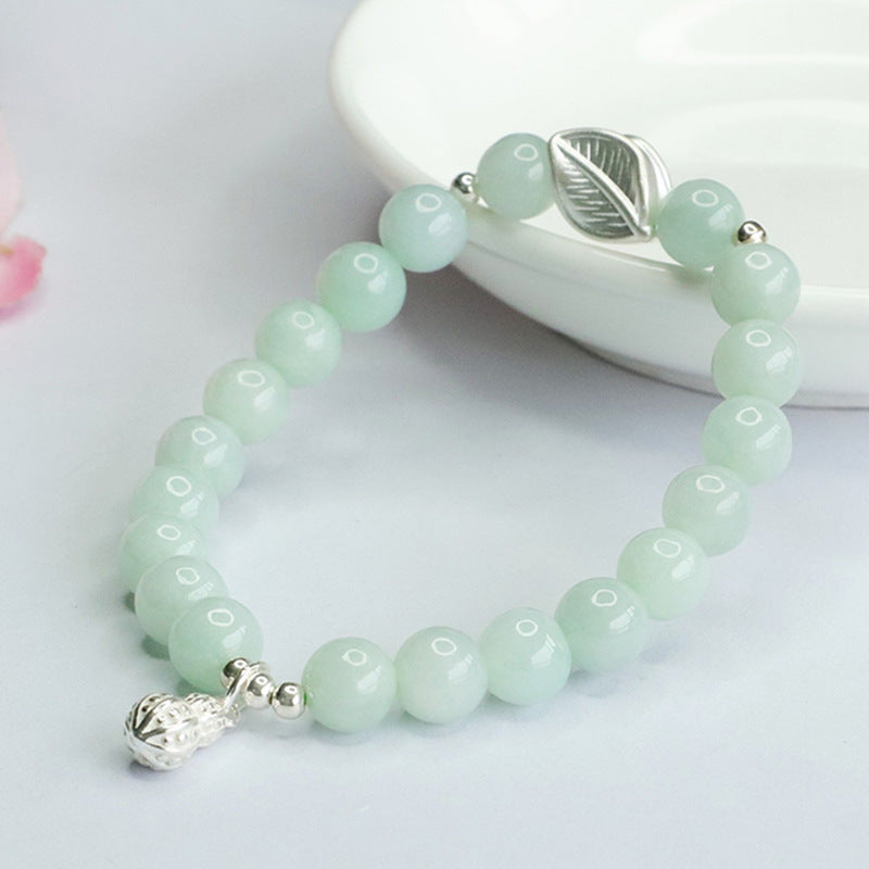 Fortune's Favor Sterling Silver Jade Bracelet with Peanut Leaf Design