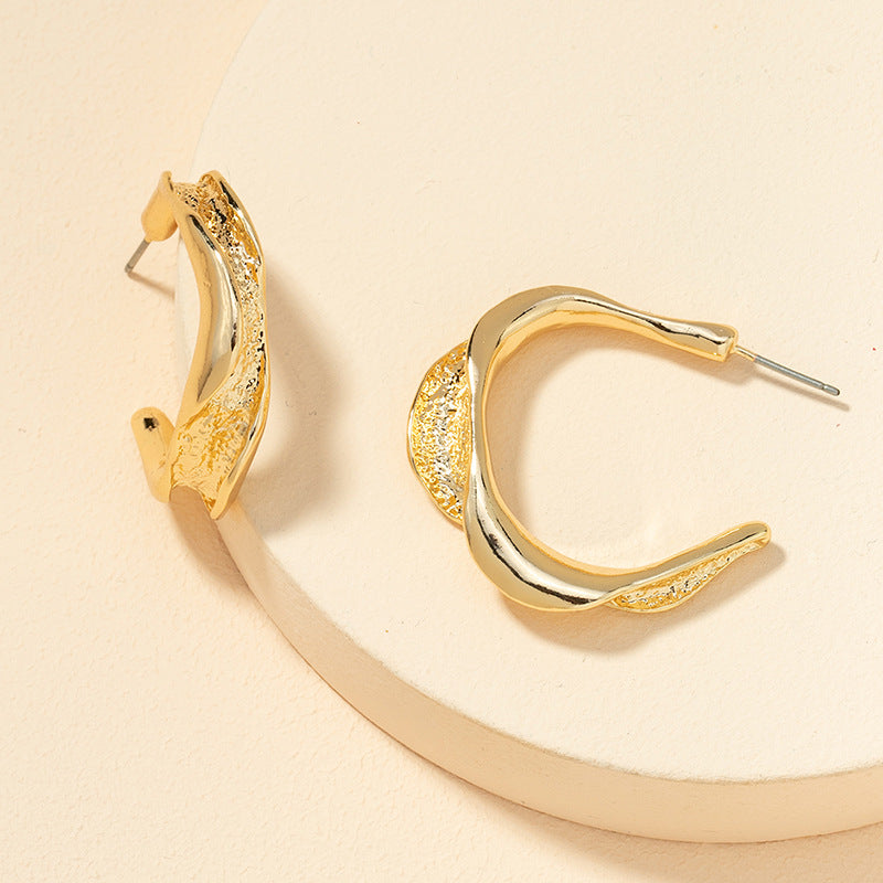 Chic Metallic C-Shaped Gold Earrings from Vienna Verve