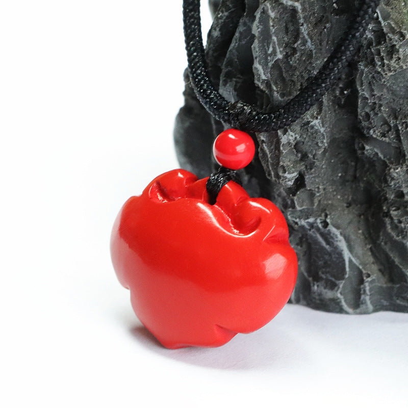 Cinnabar Stone Ruyi Lock Pendant with Red Sand Accents