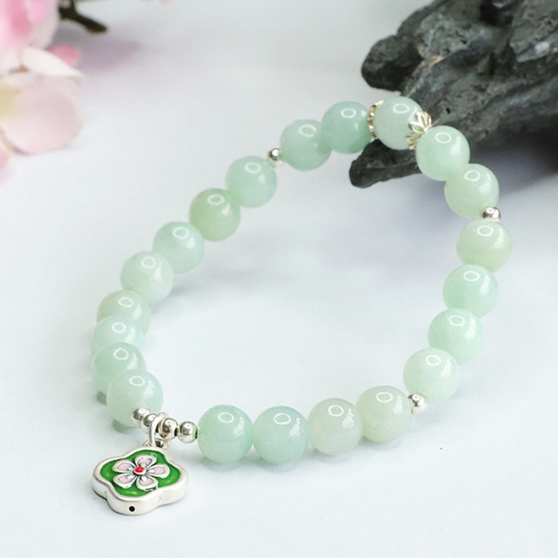 Jade Bracelet with Sterling Silver Four Leaf Flower Detail