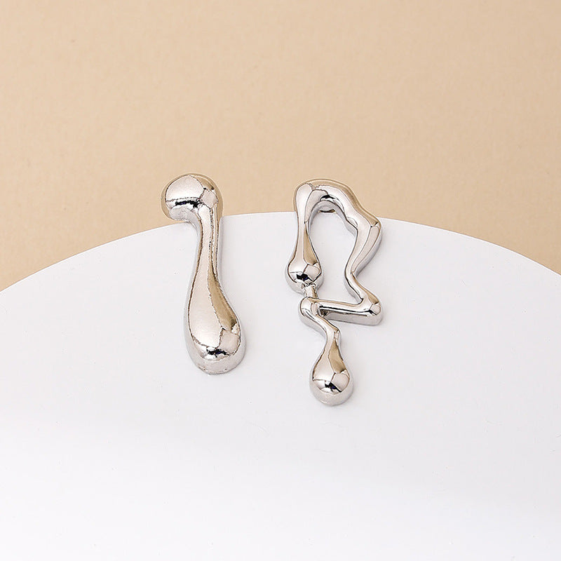 Asymmetrical Lava Vienna Verve Earrings with Music Note Detail