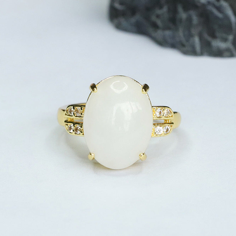 Elegant White Jade Sterling Silver Ring with Four Prongs