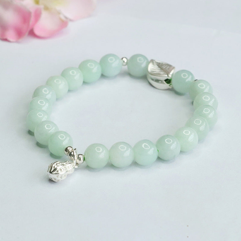 Fortune's Favor Sterling Silver Jade Bracelet with Peanut Leaf Design