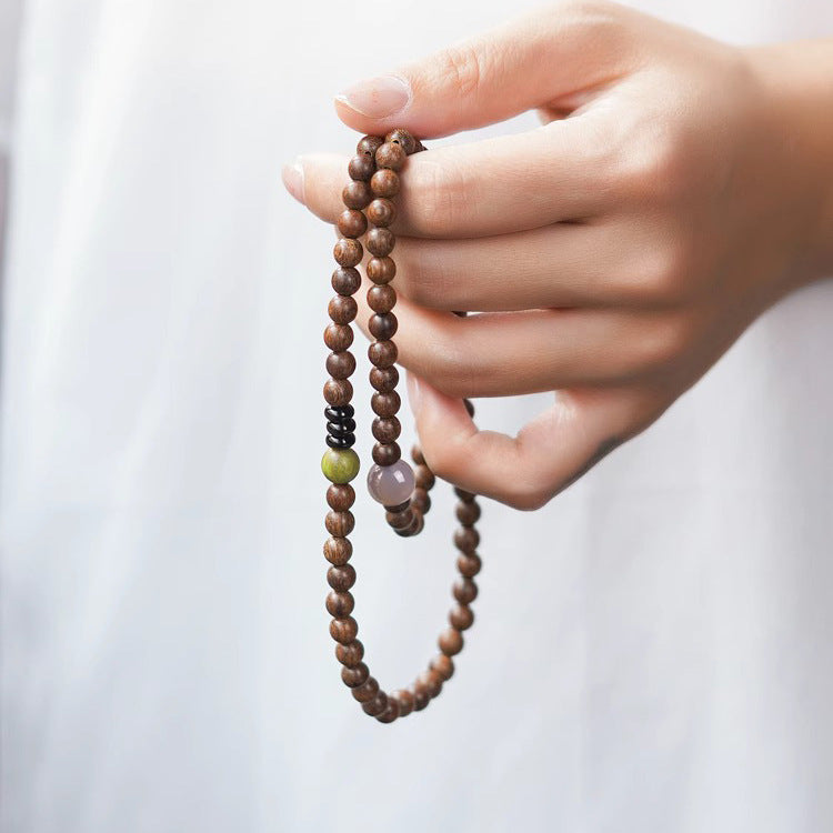 Golden Silk Sandalwood Beaded Bracelet with Small Female Student Buddha Beads