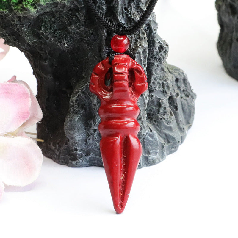 Pendant with Cinnabar Stone and Vajra Pestle Detail.