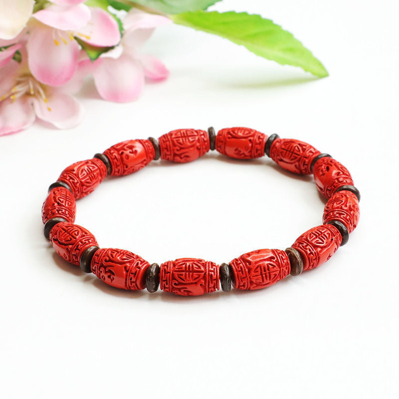 Red Sand Carved Bucket Bead Bracelet with Sterling Silver Needle