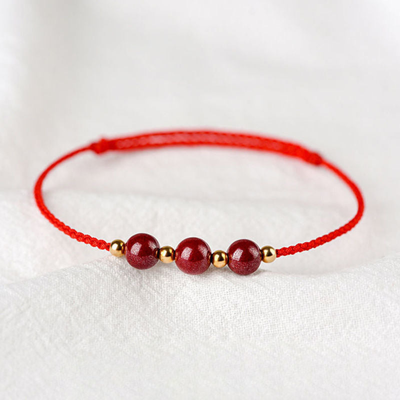 Fortune's Favor Cinnabar Stone Bracelet with Purple Gold Sand Beads