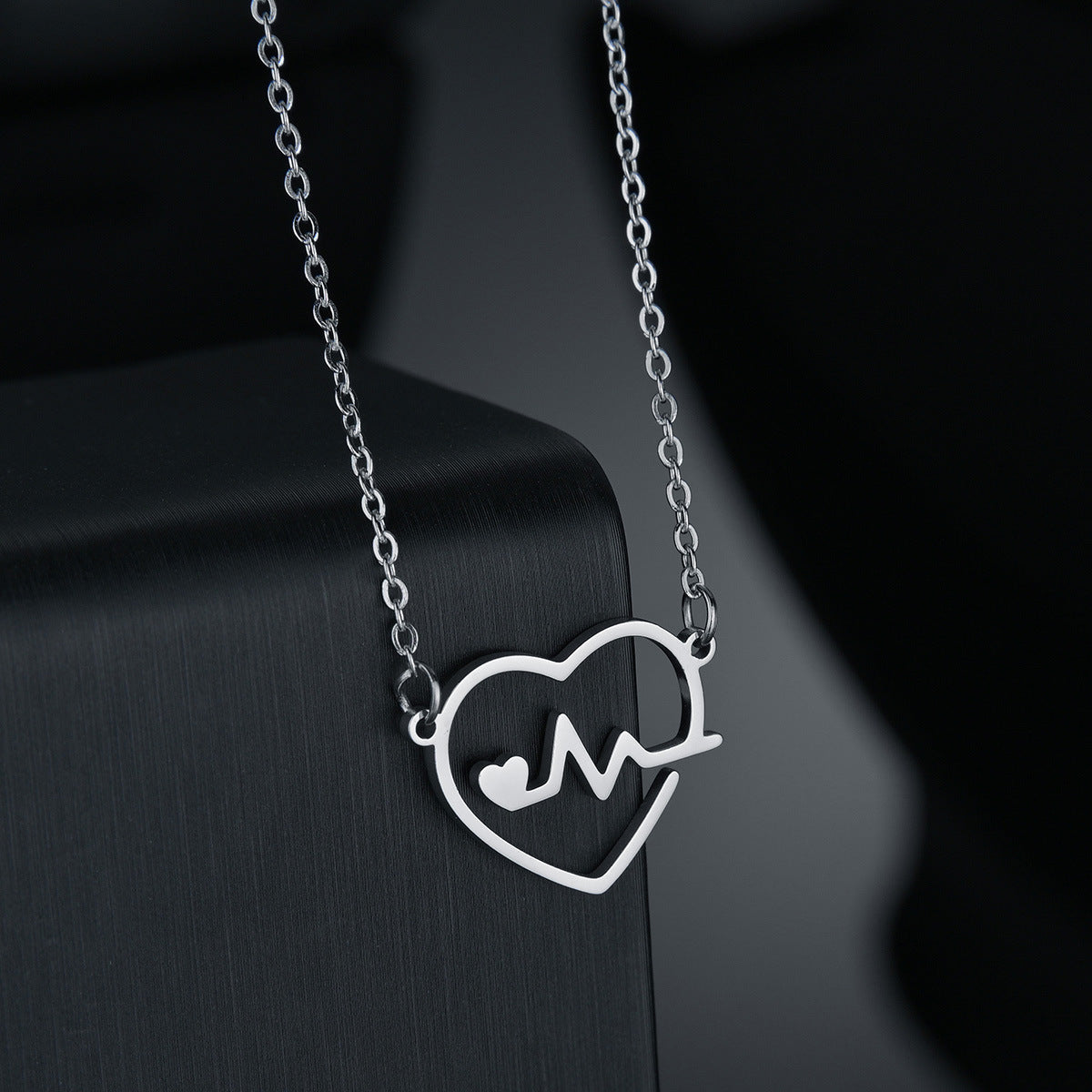 Heartbeat Harmony: Elegant Titanium Necklace - Planderful Collection