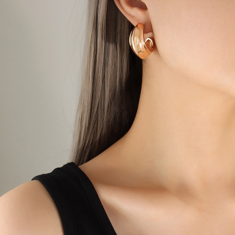 C-Shaped Textured Earrings in Gold Plated Titanium Steel