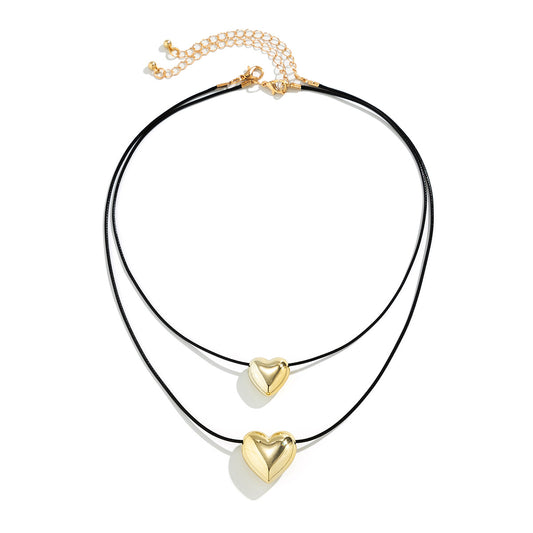 Wax Thread Bow Love Heart Necklace from Planderful's Vienna Verve Collection