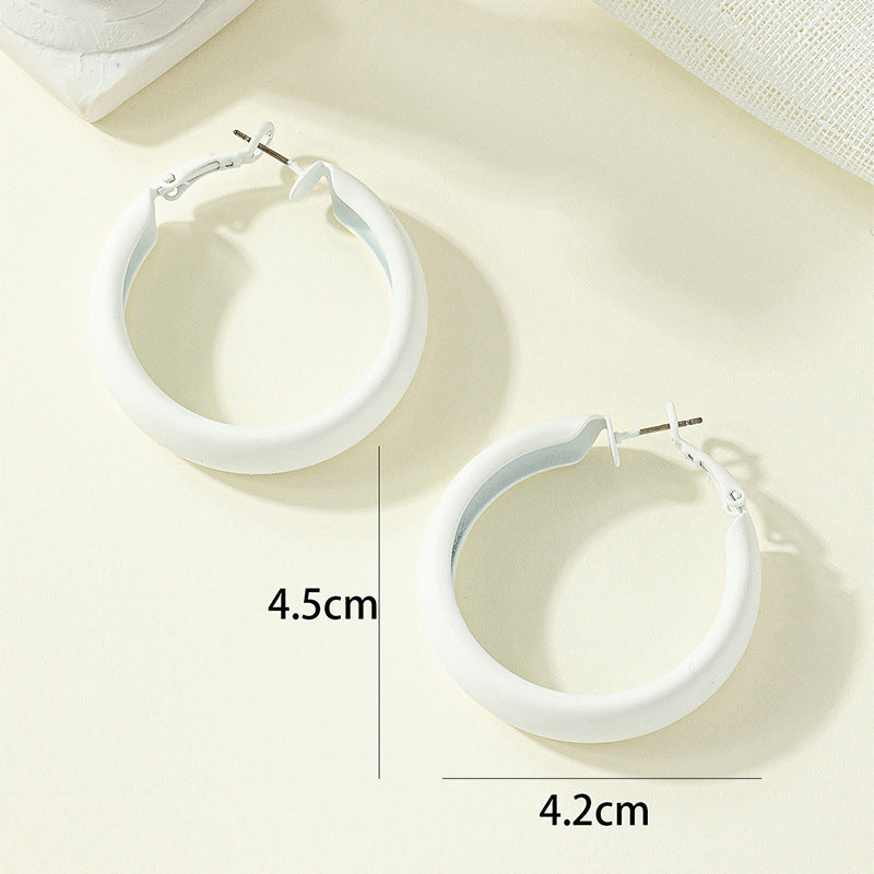 Korean-inspired Exaggerated Painted Circle Earrings with Sleek Design