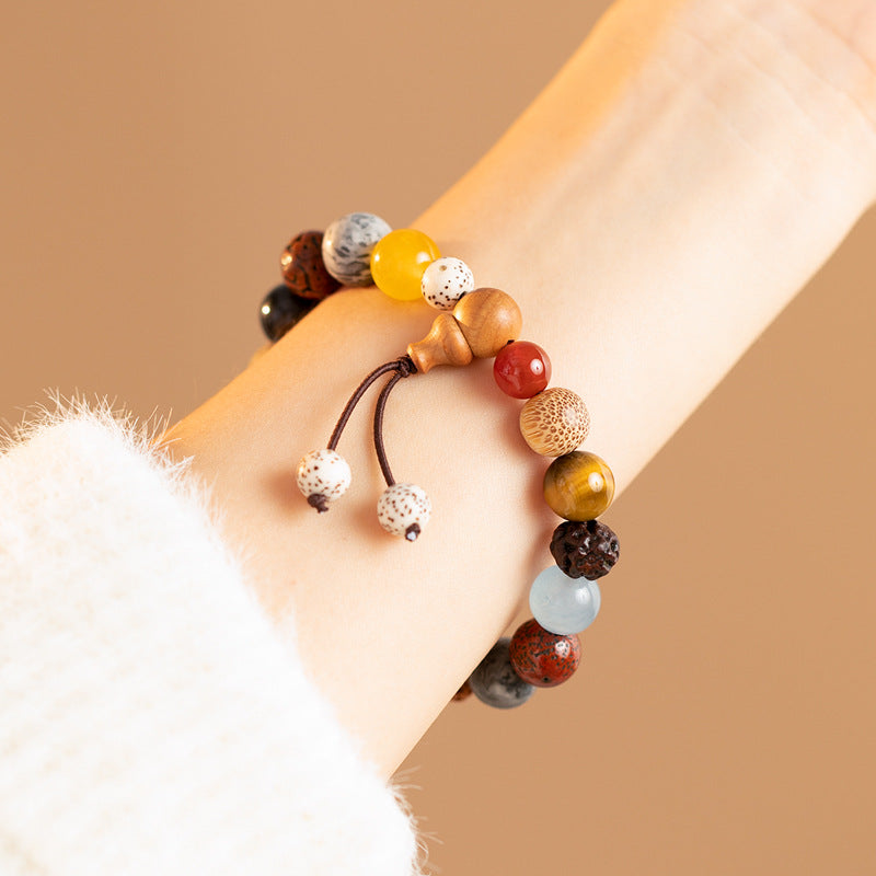 Buddha Bead and Sandalwood Cultural Bracelet with Sterling Silver and Crystal Gems