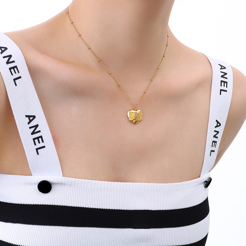 Glamorous Gold-Plated Necklace with Love Pendant and Hand Ornament