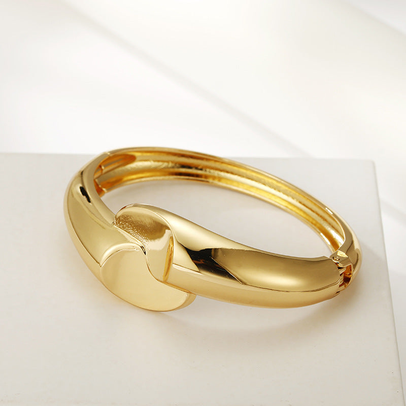 Glossy Gold Bracelet from Vienna Verve Collection