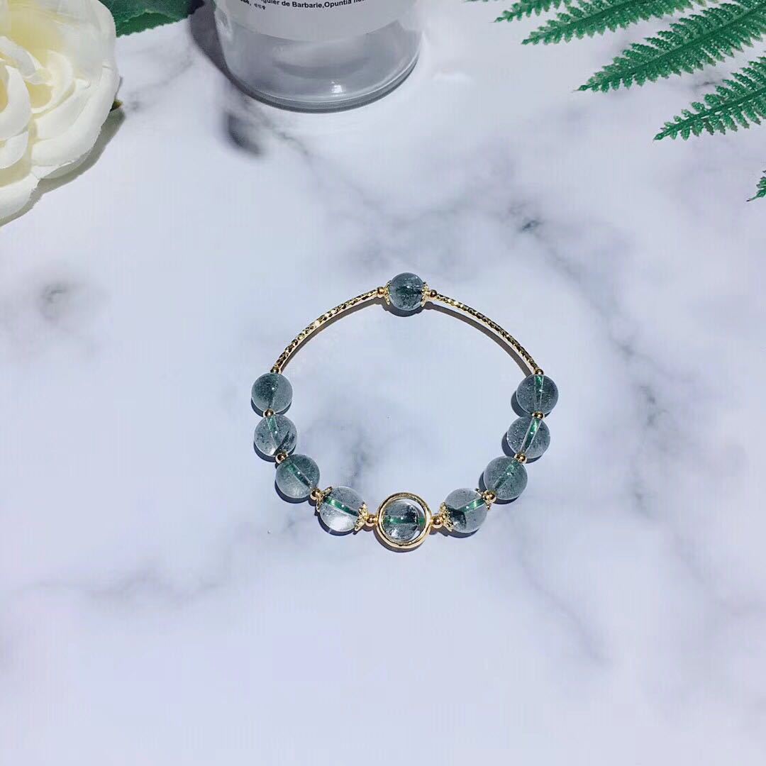 Cold and Indifferent Wind Green Ghost Crystal Bracelet - A Sterling Silver Bracelet with Captivating Green Ghost Crystal