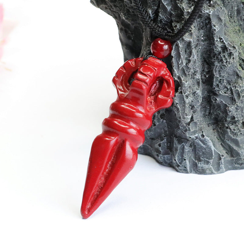 Pendant with Cinnabar Stone and Vajra Pestle Detail.