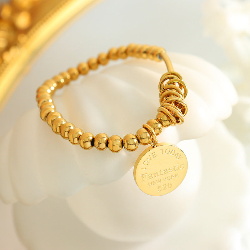 Elastic Titanium Steel Ball Bracelet Set with 18K Gold Accents