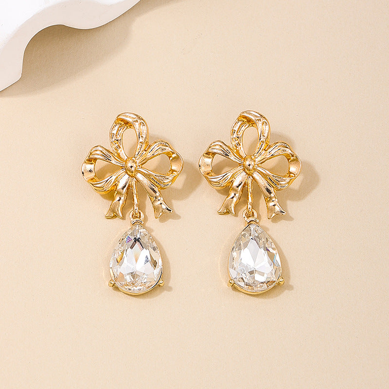 Elegant Retro European Style Hollow Bow Earrings for Women